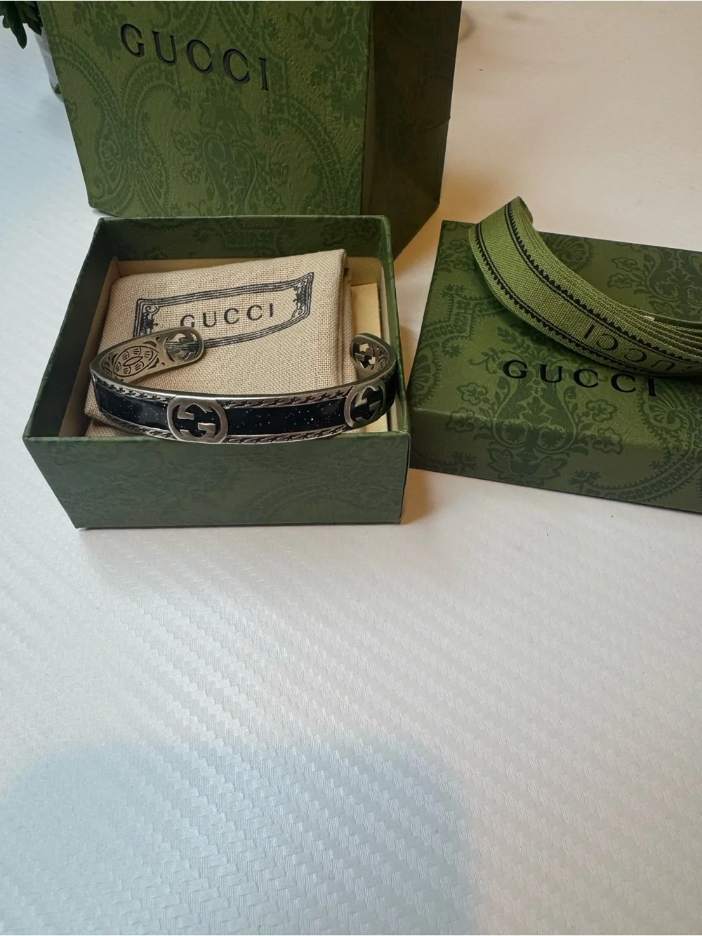 Gucci Silver-Tone Cuff with Black Inlay and Interlocking G Detail